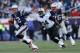 Cameron Jordan chases down Tom Brady.