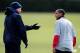 LONDON COLNEY, ENGLAND - MARCH 08: Arsenal manager Arsene Wenger has a discussion with Theo Walcott during an Arsenal training session in preparation for the Champions League second leg match between Arsenal and Porto at the Arsenal training ground on Ma