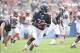 Sep 8, 2013; Chicago, IL, USA; Chicago Bears cornerback Charles Tillman (33) makes an interception during the second quarter at Soldier Field. Mandatory Credit: Mike DiNovo-USA TODAY Sports