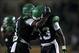 Oct 31, 2013; Denton, TX, USA; North Texas Mean Green defensive back Zed Evans (1) and defensive back James Jones (13) celebrate the win over the Rice Owls at Apogee Stadium. The Mean Green defeated the Owls 28-16. Mandatory Credit: Jerome Miron-USA TODAY