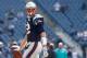 FOXBORO, MA - OCTOBER 27: Tom Brady #12 of the New England Patriots walks the field before a game with the Miami Dolphins at Gillette Stadium on October 27, 2013 in Foxboro, Massachusetts. (Photo by Jim Rogash/Getty Images)