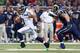 ST LOUIS, MO - OCTOBER 28: Russell Wilson #3 of the Seattle Seahawks runs with the ball during the NFL game against the St. Louis Rams at Edward Jones Dome on October 28, 2013 in St Louis, Missouri. (Photo by Andy Lyons/Getty Images)
