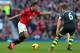 MANCHESTER, ENGLAND - OCTOBER 26: Robin Van Persie of Manchester United takes on Glenn Whelan of Stoke City during the Barclays Premier League match between Manchester United and Stoke City at Old Trafford on October 26, 2013 in Manchester, England. (Ph
