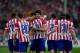 MADRID, SPAIN - OCTOBER 27: Diego Costa (4th L) of Atletico de Madrid is congratulated by David Villa and team-mates after scoring their team's fourth goal during the La Liga match between Club Atletico de Madrid and Real Betis Balompieat at Vicente Cald
