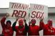 BOSTON - OCTOBER 30: Boston Red Sox fans celebrate during a World Series victory parade October 30, 2004 in Boston, Massachusetts. The Red Sox beat the Cardinals in four straight games to take the teams first World Series since 1918. (Photo by Darren Mc