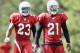 FLAGSTAFF, AZ - AUGUST 04: Cornerback Patrick Peterson #21 (R) and Hamza Abdullah #23 of the Arizona Cardinals practice during the team training camp at Northern Arizona University on August 4, 2011 in Flagstaff, Arizona. (Photo by Christian Petersen/Ge