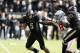 WEST LAFAYETTE, IN - NOVEMBER 2: Noah Spence #8 of the Ohio State Buckeyes sacks Danny Etling #5 of the Purdue Boilermakers during the first half of the game at Ross-Ade Stadium on November 2, 2013 in West Lafayette, Indiana. (Photo by Joe Robbins/Getty I
