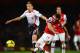 LONDON, ENGLAND - NOVEMBER 02: Lucas Leiva of Liverpool and Santi Cazorla of Arsenal battle for the ball during the Barclays Premier League match between Arsenal and Liverpool at Emirates Stadium on November 2, 2013 in London, England. (Photo by Laurenc
