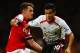 LONDON, ENGLAND - NOVEMBER 02: Aaron Ramsey of Arsenal tackles Philippe Coutinho of Liverpool during the Barclays Premier League match between Arsenal and Liverpool at Emirates Stadium on November 2, 2013 in London, England. (Photo by Laurence Griffiths/