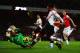 LONDON, ENGLAND - NOVEMBER 02: Wojciech Szczesny of Arsenal makes a save from Daniel Sturridge of Liverpool during the Barclays Premier League match between Arsenal and Liverpool at Emirates Stadium on November 2, 2013 in London, England. (Photo by Laur