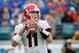 JACKSONVILLE, FL - NOVEMBER 02: Aaron Murray #11 of the Georgia Bulldogs attempts a pass during the game against the Florida Gators at EverBank Field on November 2, 2013 in Jacksonville, Florida. (Photo by Sam Greenwood/Getty Images)