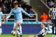 NEWCASTLE, UNITED KINGDOM - OCTOBER 30: Yohan Cabaye of Newcastle United (right) makes a challenge on David Silva of Manchester City during the Capital One Cup Fourth Round match between Newcastle United and Manchester City at St James' Park on October 30