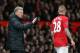 MANCHESTER, ENGLAND - OCTOBER 29: Manchester United manager David Moyes gives instructions to Alexander Buttner during the Capital One Cup Fourth Round match between Manchester United and Norwich City at Old Trafford on October 29, 2013 in Manchester, En