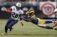 ST. LOUIS, MO - NOVEMBER 3: Chris Johnson #28 of the Tennessee Titans runs against the St. Louis Rams in the second quarter at the Edward Jones Dome on November 3, 2013 in St. Louis, Missouri. (Photo by Michael Thomas/Getty Images)