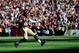 LANDOVER, MD - NOVEMBER 03: Robert Griffin III #10 of the Washington Redskins celebrates after Alfred Morris #46 (not pictured) scored a touchdown in the second quarter during an NFL game against the San Diego Chargers at FedExField on November 3, 2013 i