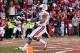 Nov 2, 2013; Fayetteville, AR, USA; Auburn Tigers running back Tre Mason (21) scores a touchdown against the Arkansas Razorbacks during the first quarter at Donald W. Reynolds Razorback Stadium. Mandatory Credit: Nelson Chenault-USA TODAY Sports