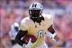Oct 26, 2013; Orlando, FL, USA; UCF Knights running back Storm Johnson (8) turns upfield before scoring a touchdown in the first quarter against the Connecticut Huskies at Bright House Networks Stadium. Mandatory Credit: David Manning-USA TODAY Sports