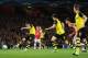 LONDON, ENGLAND - OCTOBER 22: Henrik Mkhitaryan of Borussia Dortmund scores the first goal during the UEFA Champions League Group F match between Arsenal and Borussia Dortmund at Emirates Stadium on October 22, 2013 in London, England. (Photo by Shaun B
