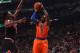 CHICAGO, IL - OCTOBER 31: Tim Hardaway, Jr. #5 of the New York Knicks puts up a shot over Jimmy Butler #21 of the Chicago Bulls on October 31, 2013 at the United Center in Chicago, Illinois. NOTE TO USER: User expressly acknowledges and agrees that, by do