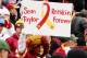 LANDOVER, MD - DECEMBER 02: A fan of the Washington Redskins hold up a sign honoring the late Sean Taylor prior to the game against the Buffalo Bills on December 2, 2007 at FedEx Field in Landover, Maryland. (Photo by Jim McIsaac/Getty Images)