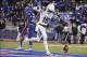 Oct 26, 2013; Lawrence, KS, USA; Baylor Bears wide receiver Tevin Reese (16) celebrates after scoring a touchdown against the Kansas Jayhawks in the first half at Memorial Stadium. Mandatory Credit: John Rieger-USA TODAY Sports