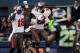 SEATTLE, WA - NOVEMBER 03: Wide receiver Skye Dawson #18 and tight end Timothy Wright #81 of the Tampa Bay Buccaneers celebrate Wright's touchdown catch during the second quarter of the game at CenturyLink Field on November 3, 2013 in Seattle, Washington.