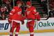 DETROIT, MI - APRIL 11: Danny DeKeyser #65 of the Detroit Red Wings talks with teammate Niklas Kronwall #55 during a NHL game against the San Jose Sharks at Joe Louis Arena on April 11, 2013 in Detroit, Michigan. San Jose defeated Detroit 3-2 in a shoot-o