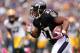 BALTIMORE, MD - OCTOBER 13: Running back Ray Rice #27 of the Baltimore Ravens rushes against the Green Bay Packers at M&T Bank Stadium on October 13, 2013 in Baltimore, Maryland. (Photo by Patrick Smith/Getty Images)