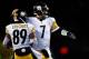 FOXBORO, MA - NOVEMBER 03: Ben Roethlisberger #7 of the Pittsburgh Steelers celebrates with teammate Jerricho Cotchery #89 after a touchdown catch in the second half against the New England Patriots at Gillette Stadium on November 3, 2013 in Foxboro, Mas