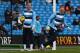 MANCHESTER, ENGLAND - NOVEMBER 02: Joe Hart of Manchester City warms up with Costel Pantilimon (R) prior to the Barclays Premier League match between Manchester City and Norwich City at Etihad Stadium on November 2, 2013 in Manchester, England. (Photo b