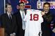 BOSTON - DECEMBER 14: (L-R) Red Sox owner John Henry and general manager Theo Epstein present Daisuke Matsuzaka with his jersey during a press conference to announce that the pitcher has signed with the Boston Red Sox on December 14, 2006 at Fenway Park