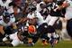 CLEVELAND, OH - NOVEMBER 03: Running back Ray Rice #27 of the Baltimore Ravens runs the ball by defensive back T.J. Ward #43 of the Cleveland Browns at FirstEnergy Stadium on November 3, 2013 in Cleveland, Ohio. (Photo by Matt Sullivan/Getty Images)