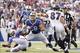 Sep 29, 2013; Orchard Park, NY, USA; Buffalo Bills middle linebacker Kiko Alonso (50) intercepted a pass as Baltimore Ravens tight end Dallas Clark (87) during the second half at Ralph Wilson Stadium. The Bills won 23-20. Mandatory Credit: Kevin Hoffman-U