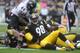 PITTSBURGH, PA - OCTOBER 20: Vince Williams #98 of the Pittsburgh Steelers stops the Baltimore Ravens on a third down play during the first quarter at Heinz Field on October 20, 2013 in Pittsburgh, Pennsylvania. (Photo by Vincent Pugliese/Getty Images)
