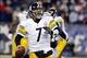 Nov 3, 2013; Foxborough, MA, USA; Pittsburgh Steelers quarterback Ben Roethlisberger (7) looks to pass against the New England Patriots in the second half at Gillette Stadium. The Patriots defeated the Steelers 55-31. Mandatory Credit: David Butler II-USA