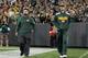 GREEN BAY, WI - NOVEMBER 04: Aaron Rodgers #12 of the Green Bay Packers returns to the field after a colar bone injury which occurred in the first half of the game against the Chicago Bears during the game at Lambeau Field on November 04, 2013 in Green Ba
