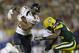 GREEN BAY, WI - NOVEMBER 04: Matt Forte #22 of the Chicago Bears runs with the football before getting tackled by M.D. Jennings #43 of the Green Bay Packers during the second half of play at Lambeau Field on November 04, 2013 in Green Bay, Wisconsin. (Pho