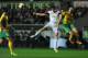 SWANSEA, WALES - OCTOBER 24: Swansea player Michu (c) beats Aleksei Kozlov (r) to the ball during the UEFA Europa League Group A match between Swansea City and FC Kuban Krasnodar at Liberty Stadium on October 24, 2013 in Swansea, Wales. (Photo by Stu Fo