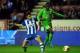 WIGAN, ENGLAND - OCTOBER 24: Jordi Gomez of Wigan Athletic in action with Chris Mavinga of Rubin Kazan during the UEFA Europa League Group D match between Wigan Athletic and Rubin Kazan on October 24, 2013 in Wigan, England. (Photo by Chris Brunskill/Gett