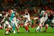 MIAMI GARDENS, FL - OCTOBER 31: Andy Dalton #14 of the Cincinnati Bengals looks turnover pass the ball during a game against the Miami Dolphins at Sun Life Stadium on October 31, 2013 in Miami Gardens, Florida. (Photo by Chris Trotman/Getty Images)