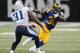 ST. LOUIS, MO - NOVEMBER 3: Zac Stacy #30 of the St. Louis Rams runs against the Tennessee Titans in the fourth quarter at the Edward Jones Dome on November 3, 2013 in St. Louis, Missouri. (Photo by Michael Thomas/Getty Images)