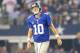ARLINGTON, TX - SEPTEMBER 08: Quarterback Eli Manning #10 of the New York Giants reacts in the first quarter against the Dallas Cowboys in the first half on September 8, 2013 at AT&T Stadium in Arlington, Texas. (Photo by Ronald Martinez/Getty Images)