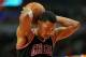 CHICAGO, IL - OCTOBER 31: Derrick Rose #1 of the Chicago Bulls prepares to shoot a free throw against the New York Knicks at the United Center on October 31, 2013 in Chicago, Illinois. The Bulls defeated the Knicks 82-81. NOTE TO USER: User expressly ack