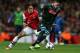 LONDON, ENGLAND - OCTOBER 01: Jose Callejon of Napoli is challenged by Tomas Rosicky of Arsenal during UEFA Champions League Group F match between Arsenal FC and SSC Napoli at Emirates Stadium on October 1, 2013 in London, England. (Photo by Paul Gilham