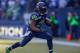 SEATTLE, WA - NOVEMBER 03: Running back Marshawn Lynch #24 of the Seattle Seahawks rushes against the Tampa Bay Buccaneers at CenturyLink Field on November 3, 2013 in Seattle, Washington. (Photo by Otto Greule Jr/Getty Images)
