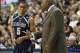 Feb 27, 2013; Storrs, CT, USA; Georgetown Hoyas guard Markel Starks (5) talks with head coach John Thompson III as they take on the Connecticut Huskies during the second half at Gampel Pavilion. Georgetown defeated the Huskies in double overtime 79-78. Ma