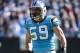 Nov 3, 2013; Charlotte, NC, USA; Carolina Panthers middle linebacker Luke Kuechly (59) reacts after tackling Atlanta Falcons running back Jacquizz Rodgers (32) in the first quarter at Bank of America Stadium. Mandatory Credit: Bob Donnan-USA TODAY Sports