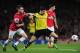 LONDON, ENGLAND - OCTOBER 22: Laurent Koscielny of Arsenal and Robert Lewandowski of Borussia Dortmund battle for the ball during the UEFA Champions League Group F match between Arsenal and Borussia Dortmund at Emirates Stadium on October 22, 2013 in Lo