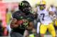 ARLINGTON, TX - SEPTEMBER 03: LaMichael James #21 of the Oregon Ducks runs the ball against the LSU Tigers at Cowboys Stadium on September 3, 2011 in Arlington, Texas. (Photo by Ronald Martinez/Getty Images)