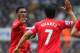 NEWCASTLE UPON TYNE, ENGLAND - OCTOBER 19: Daniel Sturridge of Liverpool high fives Luis Suarez of Liverpool during the Barclays Premier League match between Newcastle United and Liverpool at St James' Park on October 19, 2013 in Newcastle upon Tyne, Eng